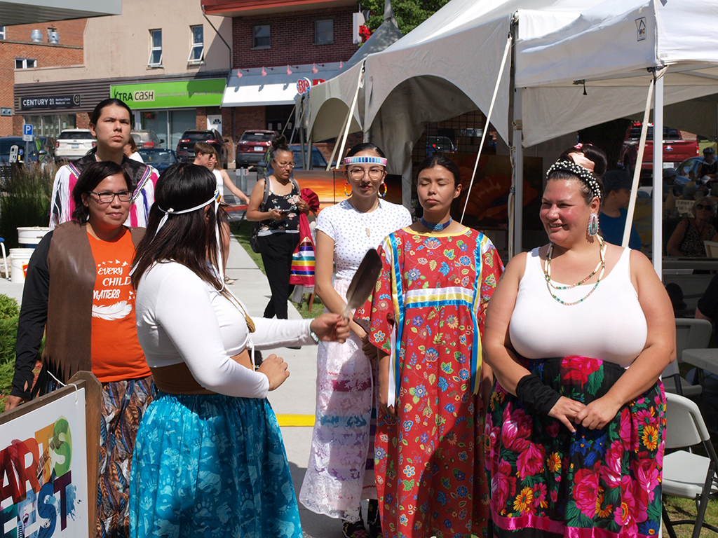 Indigenous people in regalia